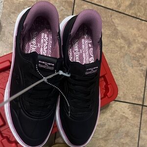 Skechers Women's Black Slip In Sneakers with Purple Accent